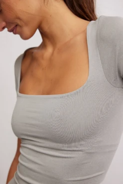 FREE PEOPLE Clean Lines Baby Tee 5 FREE PEOPLE Clean Lines Baby Tee -Occasionally Yours fp clean lines baby tee heather grey 4